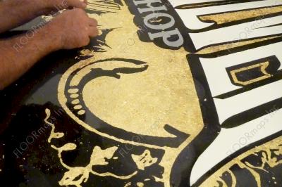 Gold and Silver Pawn Shop logo is complete and the last of our 3.4 mil vinyl stencil is being removed and touch-ups are being made.