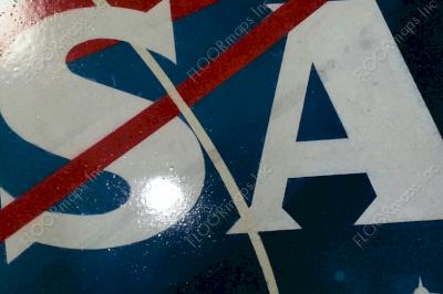 Close up of NASA design installed with Dye and Sealed on polished concrete.