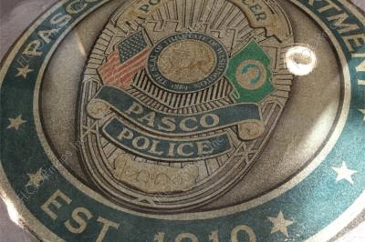 Freshly buffed, the color of the Pasco Police badge and logo pop showing off the Ameripolish patriot blue, gold, green, turquoise, black, and grey gradients.