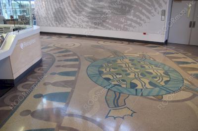 Facing the back portion of a custom 17 ft turtle and background design finished to a perfect polish in the Echuca Regional Health hospital lobby.