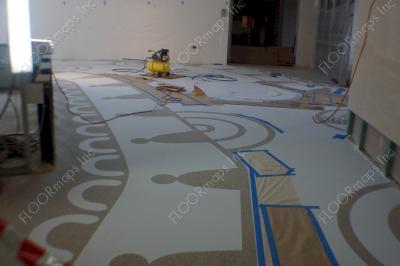 Background design fully laid out in our 3.4 mil vinyl stencils covering over 600 sq.ft preparing for dye application.