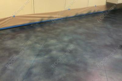 Patriot Blue Ameripolish concrete dye applied to the floor over pin stripping tape.