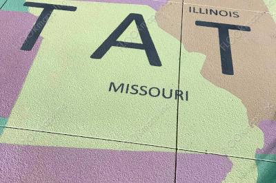Close up of Missouri, Arkansas, Illinois, Iowa, Minnesota, and Wisconsin, installed with colored cementitious epoxy.
