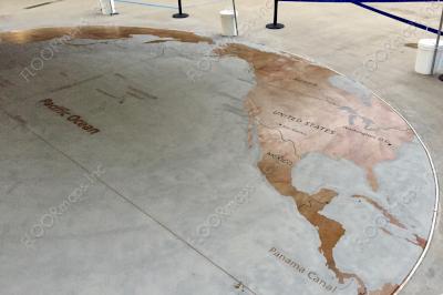 Top side overview of Pacific War World Map years 1941-1945 installed using 30 mil Blast Resist vinyl stencil on previously colored brown cementitious overlay, sand blasted and colored with black concrete stain.