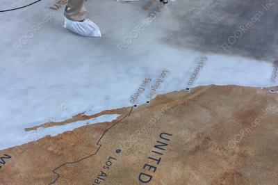Sealer is being applied over the top of the Pacific War World Map years 1941-1945