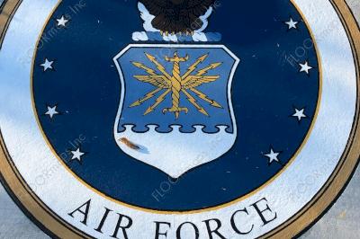 US Air Force Seal on gold microtopping circle and white, black, blue, yellow, and brown spray paint installed with 3.4 mil vinyl stencil and Deco Guard sealer