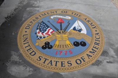 US Army Seal on light gold microtopping circle and blue, yellow, black, red, gold, and white spray paint installed with 3.4 mil vinyl stencil and Deco Guard sealer