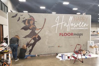 Our FLOORmaps Halloween witch installed demo with dyes on a vertical concrete overlay.