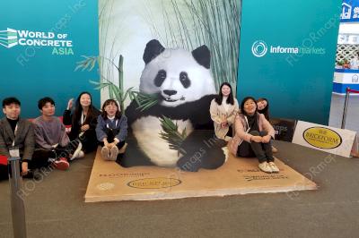 Full 3D panda design printed on solid 3.4 mil vinyl with skid resist add on. A crowd sits to take a picture.