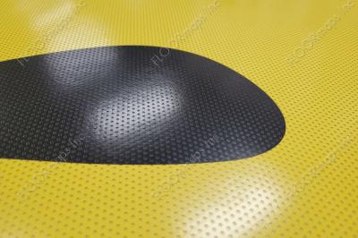 Close up of 80/20 perforated print panels showing the black and yellow leopard design.
