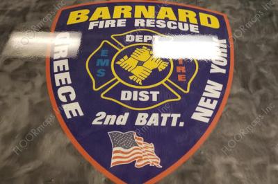Full view of 80/20 perforated print of Barnard Fire Department logo.