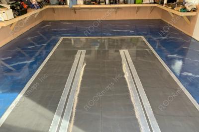 Pre install of F15 Strike Eagle 80/20 Perforated Print installed on blue metallic coated floor sealed with polyaspartic Clear Coat.