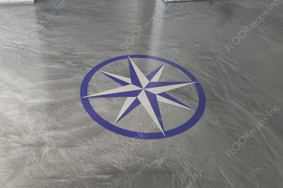 Purple and Silver Nautical Star installed on a silver metallic epoxy floor.